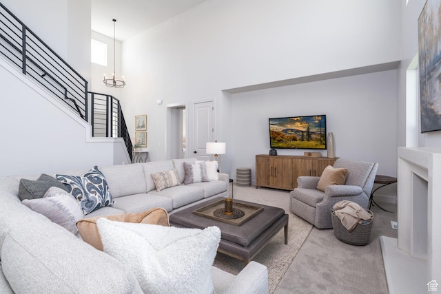 291 E 1980 N, Heber City, UT 84032 - carpeted living area featuring stairs, a high ceiling, and a chandelier