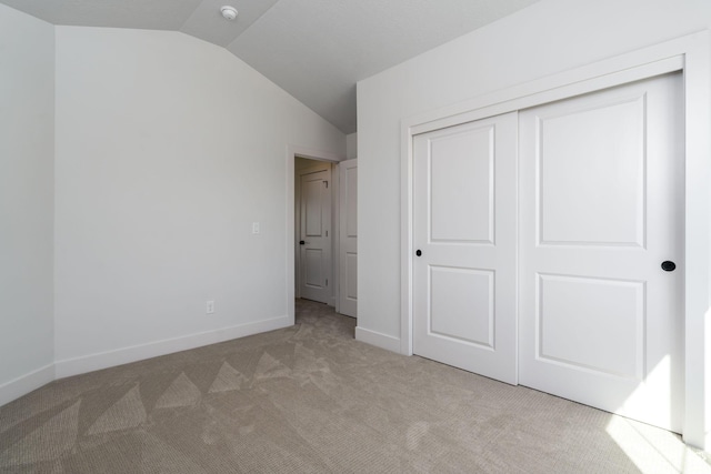 291 E 1980 N, Heber City, UT 84032 - unfurnished bedroom featuring lofted ceiling, a closet, carpet, and baseboards