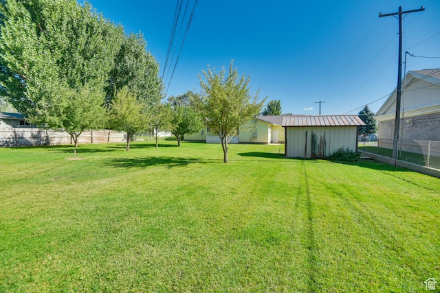 265 E Center St, Beaver, UT 84713 - view of yard with fence and an outdoor structure