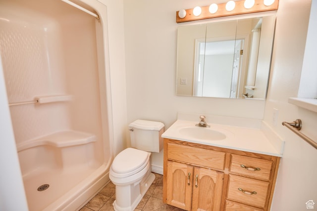 265 E Center St, Beaver, UT 84713 - full bath with toilet, a shower stall, vanity, and tile patterned floors