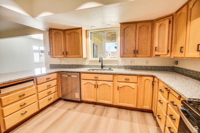 265 E Center St, Beaver, UT 84713 - kitchen featuring a sink, light wood-style floors, stainless steel dishwasher, range, and light stone countertops