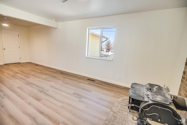 265 E Center St, Beaver, UT 84713 - spare room featuring baseboards, visible vents, wood finished floors, and beamed ceiling