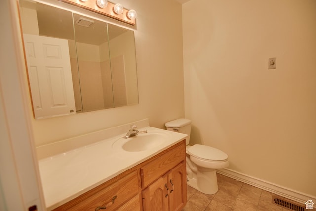 265 E Center St, Beaver, UT 84713 - bathroom featuring baseboards, visible vents, toilet, tile patterned floors, and vanity