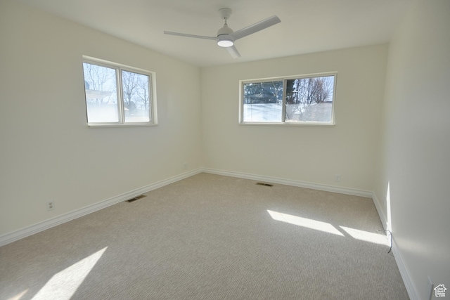 265 E Center St, Beaver, UT 84713 - unfurnished room featuring light carpet, visible vents, and baseboards