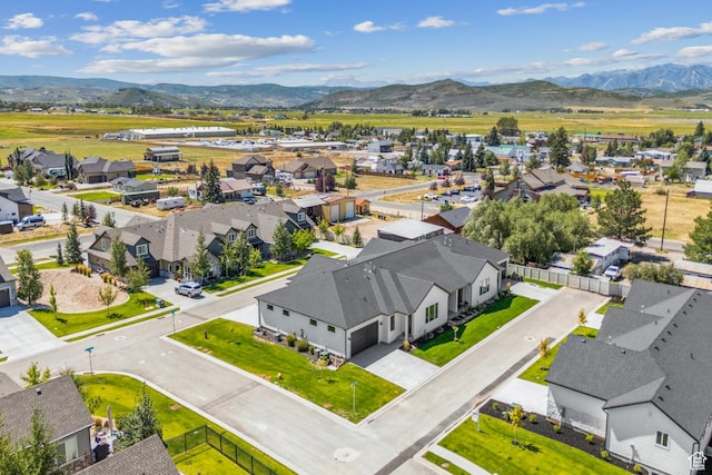 aerial view featuring a residential view and a mountain view