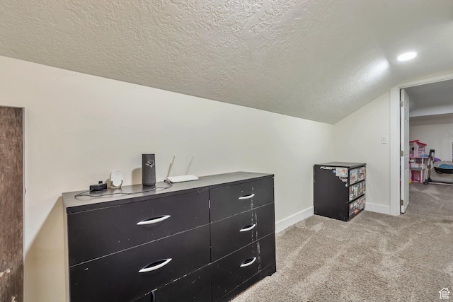 22 W 200 S, Tooele, UT 84074 - bonus room featuring a textured ceiling, light colored carpet, baseboards, and lofted ceiling