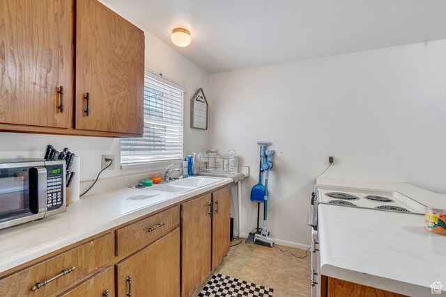 535 N 700 E Unit 1-4, Spanish Fork, UT 84660 - kitchen with white range with electric stovetop and sink