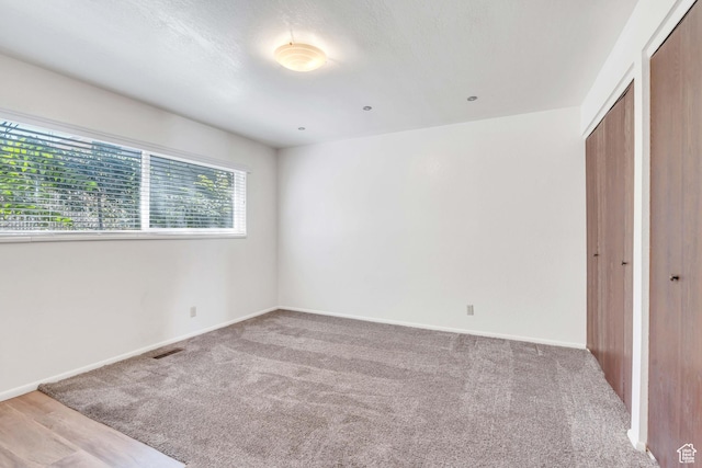 535 N 700 E Unit 1-4, Spanish Fork, UT 84660 - unfurnished bedroom with carpet, a closet, and baseboards