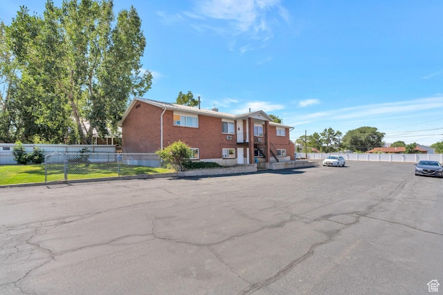 535 N 700 E Unit 1-4, Spanish Fork, UT 84660 - view of front of house featuring uncovered parking and brick siding