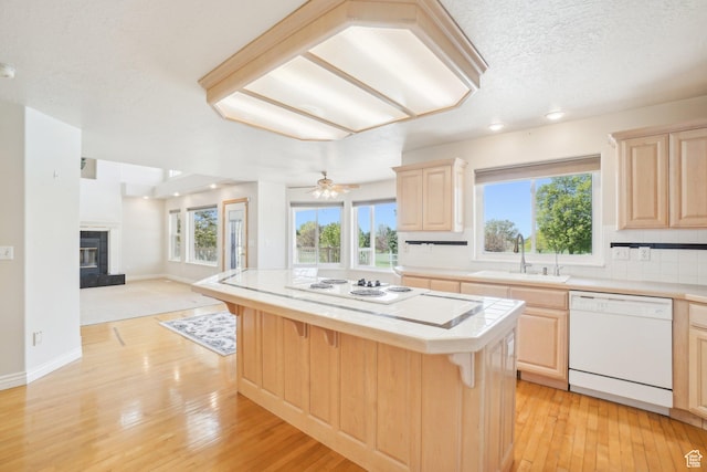 678 Eagle Way, Fruit Heights, UT 84037 - kitchen with open floor plan, light brown cabinets, a sink, and white appliances