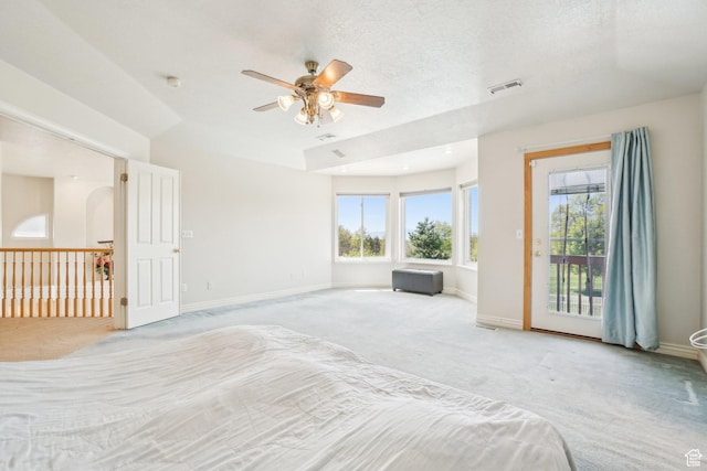 678 Eagle Way, Fruit Heights, UT 84037 - unfurnished bedroom with multiple windows, visible vents, light colored carpet, and access to outside