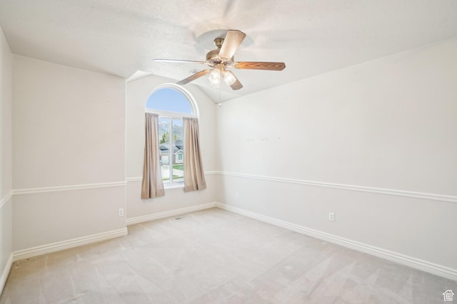 678 Eagle Way, Fruit Heights, UT 84037 - unfurnished room featuring vaulted ceiling, carpet, baseboards, and ceiling fan