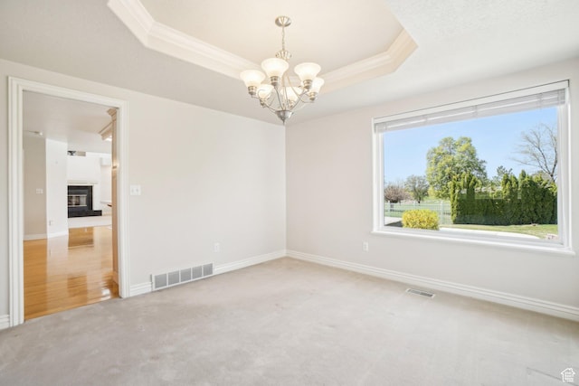 678 Eagle Way, Fruit Heights, UT 84037 - unfurnished room with crown molding, visible vents, an inviting chandelier, and a tray ceiling