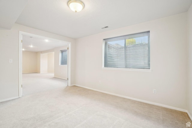 678 Eagle Way, Fruit Heights, UT 84037 - spare room featuring baseboards, visible vents, and carpet