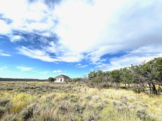 view of landscape with a rural view