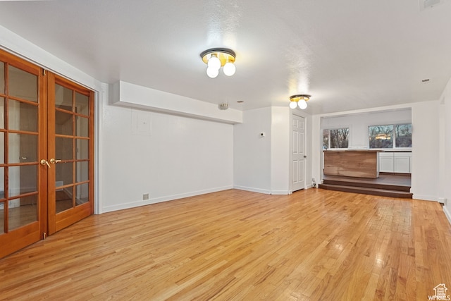 329 E Main St, Duchesne, UT 84021 - unfurnished living room featuring a textured ceiling and light wood-type flooring