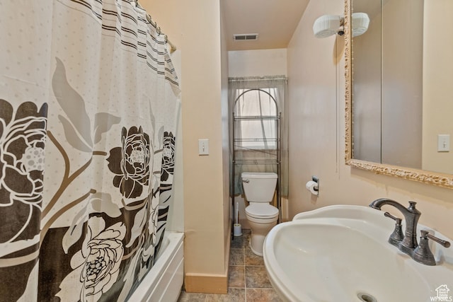 329 E Main St, Duchesne, UT 84021 - full bathroom featuring shower / bath combination with curtain, tile patterned flooring, sink, and toilet