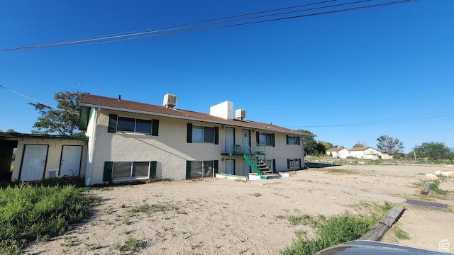 370 W 620 N, Castle Dale, UT 84513 - back of house featuring central air condition unit and brick siding