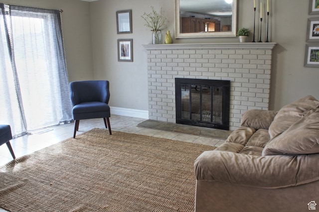 715 W 1600 N, Mapleton, UT 84664 - living room featuring a fireplace, tile patterned flooring, and baseboards