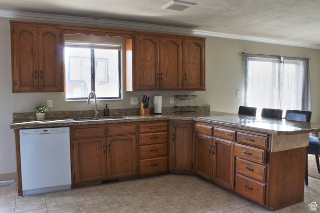 715 W 1600 N, Mapleton, UT 84664 - kitchen with dishwasher, a sink, a peninsula, ornamental molding, and brown cabinets