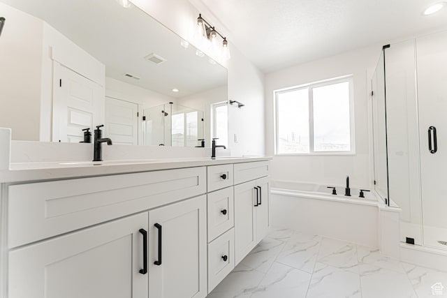 652 W Salvia Dr Unit 2144, Saratoga Springs, UT 84045 - bathroom featuring a stall shower, marble look tile flooring, double vanity, a bath, and recessed lighting