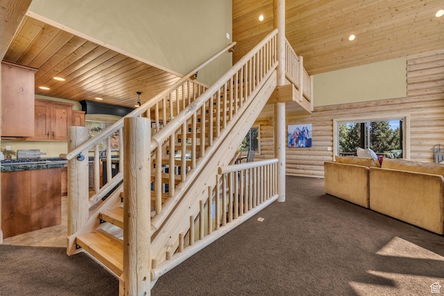 5404 Mountain Vw, Kamas, UT 84036 - stairs with high vaulted ceiling, wooden ceiling, carpet flooring, log walls, and recessed lighting