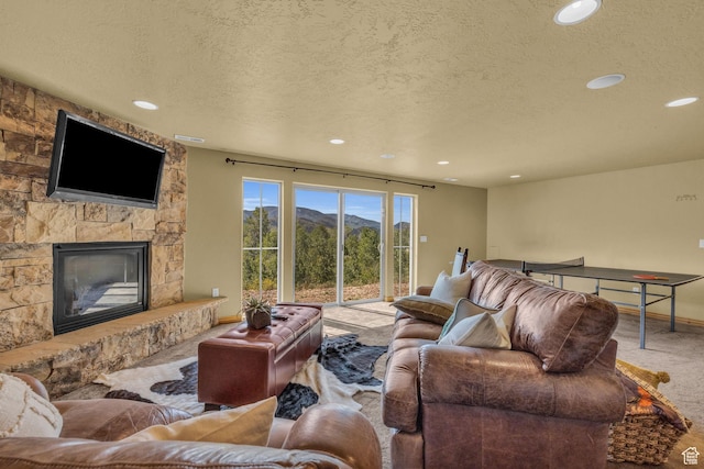 5404 Mountain Vw, Kamas, UT 84036 - carpeted living room with a stone fireplace, baseboards, recessed lighting, and a textured ceiling