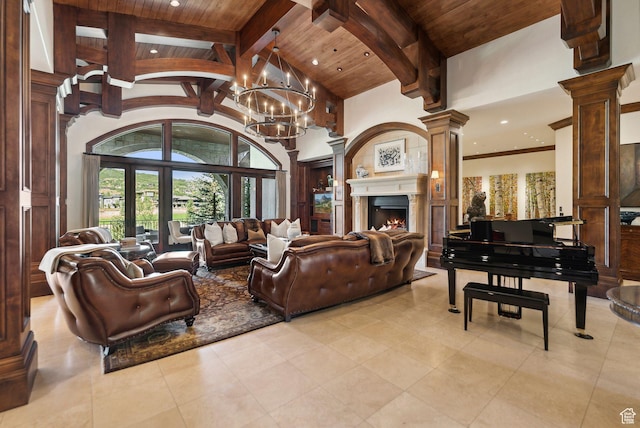 340 Hollyhock St, Park City, UT 84098 - living room with decorative columns, high vaulted ceiling, beamed ceiling, a lit fireplace, and wood ceiling