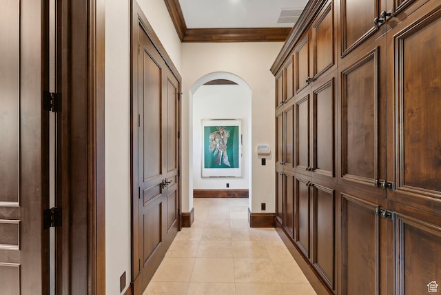 340 Hollyhock St, Park City, UT 84098 - corridor featuring arched walkways, baseboards, light tile patterned floors, and crown molding