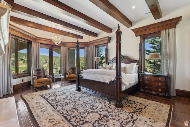 340 Hollyhock St, Park City, UT 84098 - bedroom with multiple windows, wood-type flooring, a chandelier, and beam ceiling