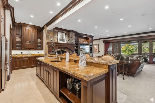 340 Hollyhock St, Park City, UT 84098 - kitchen with a sink, ornamental molding, an island with sink, open floor plan, and high end refrigerator