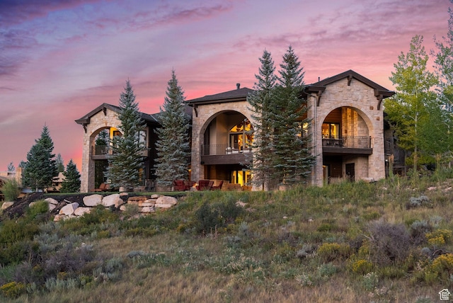 340 Hollyhock St, Park City, UT 84098 - mediterranean / spanish-style home featuring stone siding and a balcony