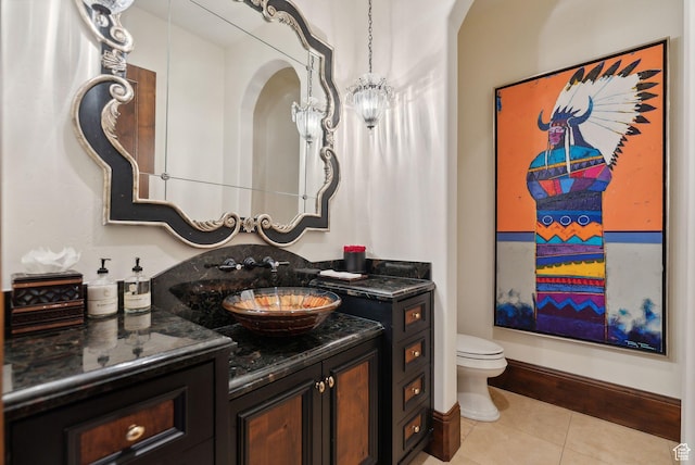 340 Hollyhock St, Park City, UT 84098 - half bath featuring toilet, baseboards, tile patterned flooring, and vanity