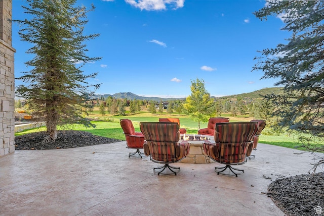 340 Hollyhock St, Park City, UT 84098 - view of patio / terrace with an outdoor fire pit and a mountain view