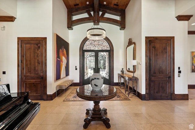 340 Hollyhock St, Park City, UT 84098 - foyer entrance featuring light tile patterned flooring, baseboards, high vaulted ceiling, and beam ceiling