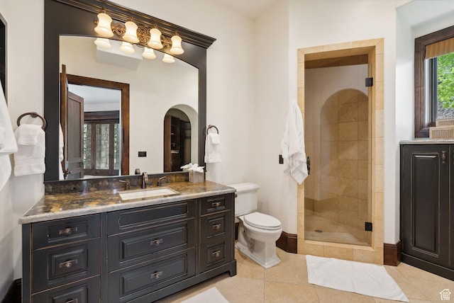 340 Hollyhock St, Park City, UT 84098 - bathroom featuring a shower stall, tile patterned floors, vanity, and toilet