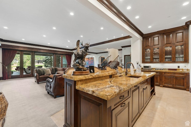 340 Hollyhock St, Park City, UT 84098 - kitchen with ornamental molding, light stone countertops, open floor plan, and a sink