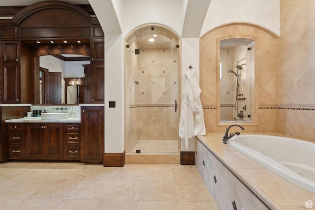 340 Hollyhock St, Park City, UT 84098 - bathroom featuring a stall shower, tile patterned floors, a garden tub, and vanity