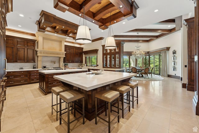 340 Hollyhock St, Park City, UT 84098 - kitchen featuring a large island, backsplash, recessed lighting, and beam ceiling