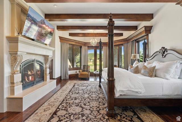 340 Hollyhock St, Park City, UT 84098 - bedroom with multiple windows, a high end fireplace, beam ceiling, and access to exterior