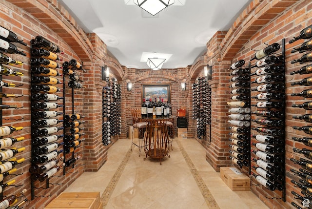 340 Hollyhock St, Park City, UT 84098 - wine room with light tile patterned floors and brick wall