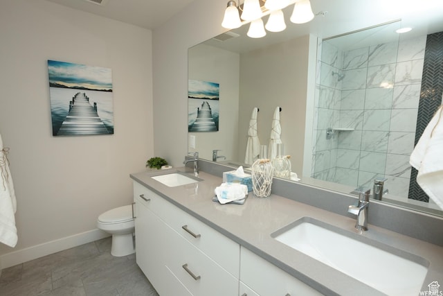 553 S 100 W Unit 203, Richfield, UT 84701 - bathroom featuring double vanity, a chandelier, and tiled shower