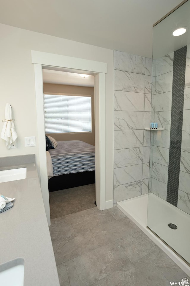 553 S 100 W Unit 203, Richfield, UT 84701 - ensuite bathroom featuring a marble finish shower and baseboards