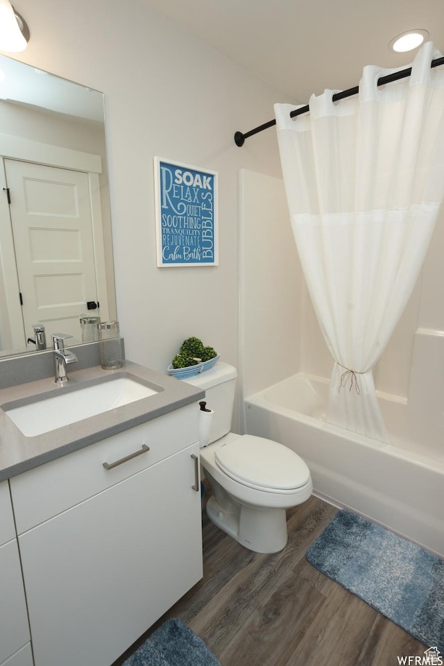 553 S 100 W Unit 203, Richfield, UT 84701 - bathroom with wood finished floors, vanity, and shower / bath combination with curtain