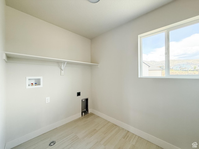 1546 S Lukas Ln, Saratoga Springs, UT 84045 - laundry room with light wood-type flooring, washer hookup, and electric dryer hookup