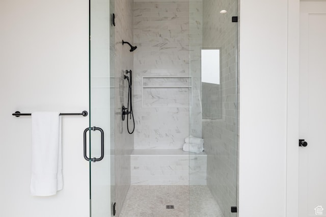 full bathroom with a shower stall