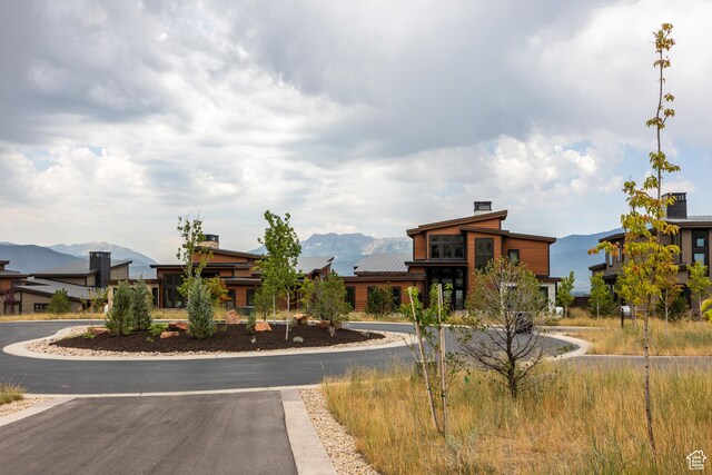 838 N Burro Peak Cir, Heber City, UT 84032 - view of building exterior featuring a mountain view and driveway