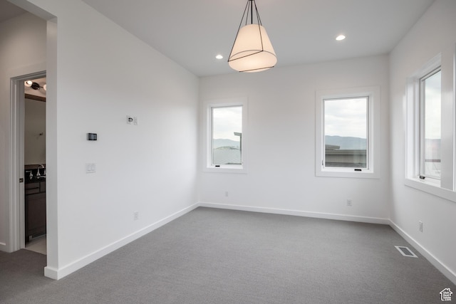 838 N Burro Peak Cir, Heber City, UT 84032 - empty room featuring dark colored carpet, baseboards, recessed lighting, and a sink