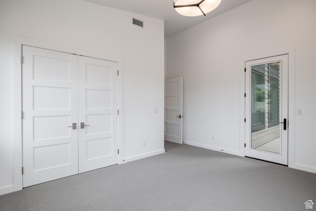 838 N Burro Peak Cir, Heber City, UT 84032 - unfurnished bedroom featuring carpet floors, baseboards, a closet, and ensuite bathroom