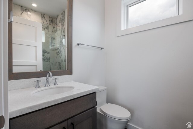 838 N Burro Peak Cir, Heber City, UT 84032 - bathroom featuring vanity, toilet, and a marble finish shower